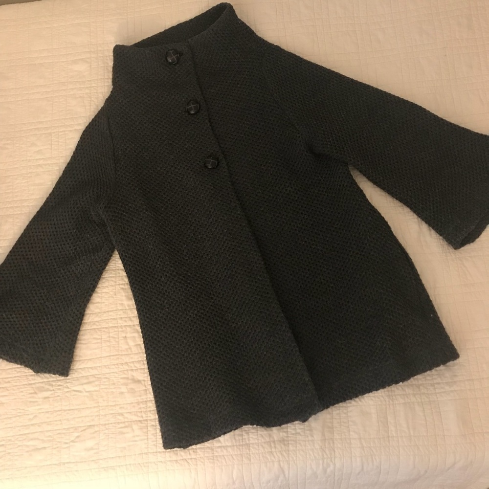 Split front, three button turtle neck sweater